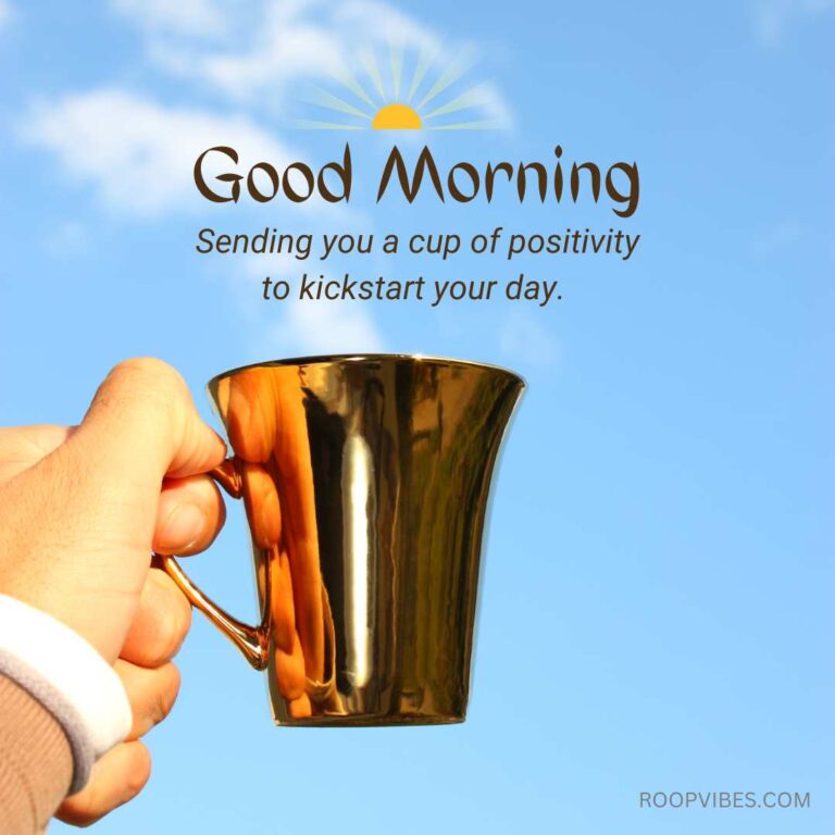 Human Hand Holding A Cup Against A Blue Sky With A Good Morning Positivity Quote