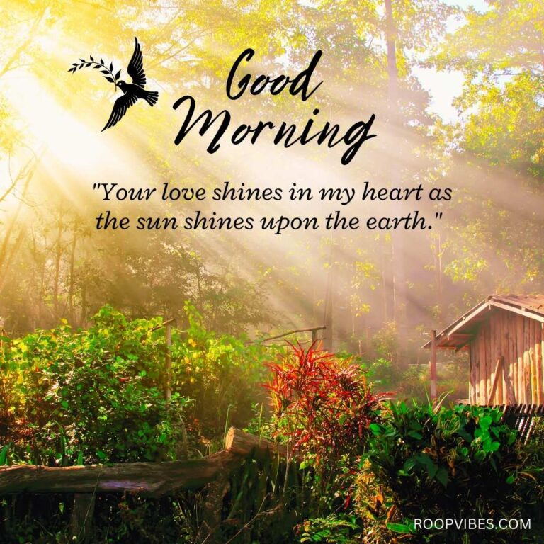 Scenic View Of A Wooden Cottage Amidst Dense Foliage With Sunrays Piercing Through Trees, Accompanied By A Good Morning Love Quote